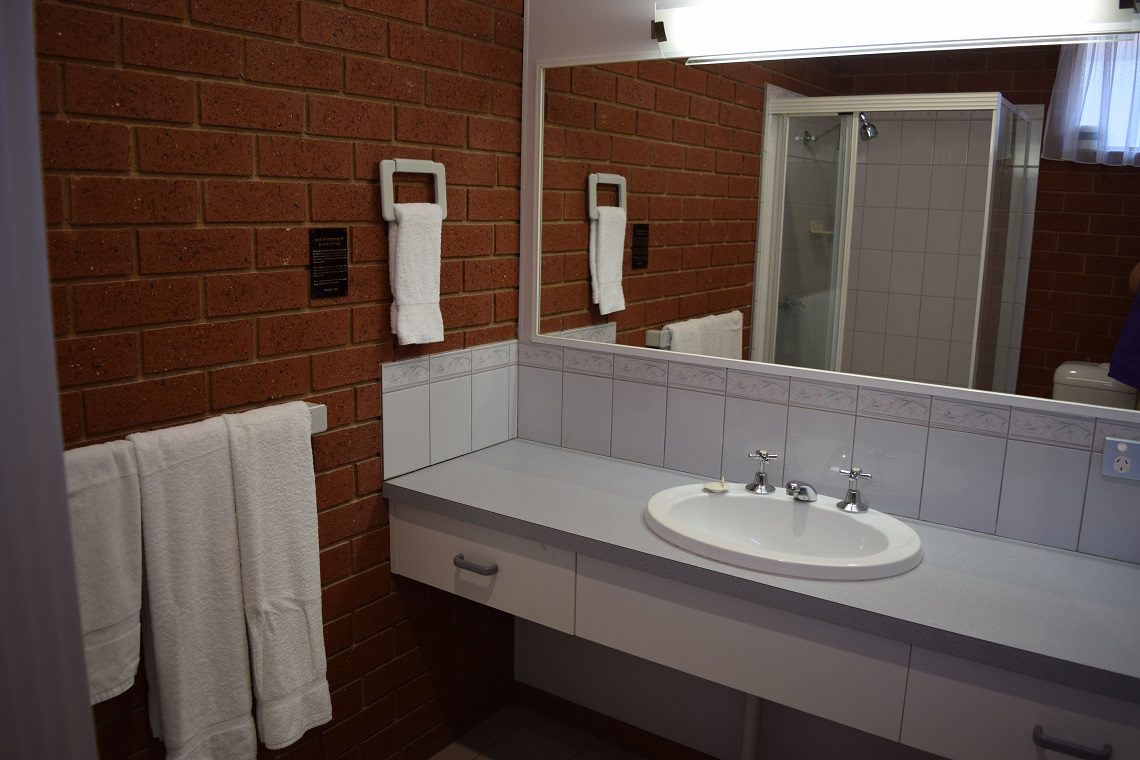 Executive Suite bathroom with vanity