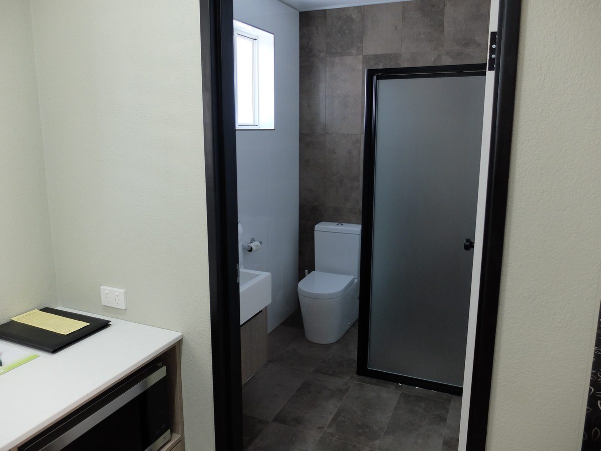 Studio Apartment kitchen with night bridge splashback