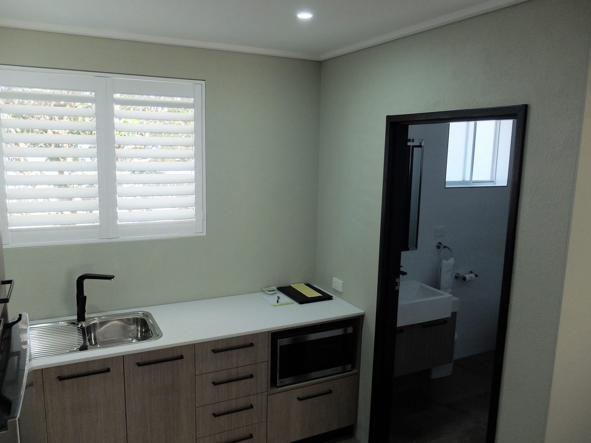 Studio Apartment kitchenette and bathroom entrance